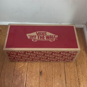 All black slip on Vans